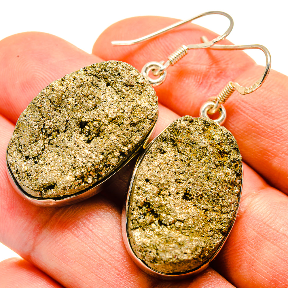 Rough pyrite oval earrings with textured gold stone and 925 silver hooks