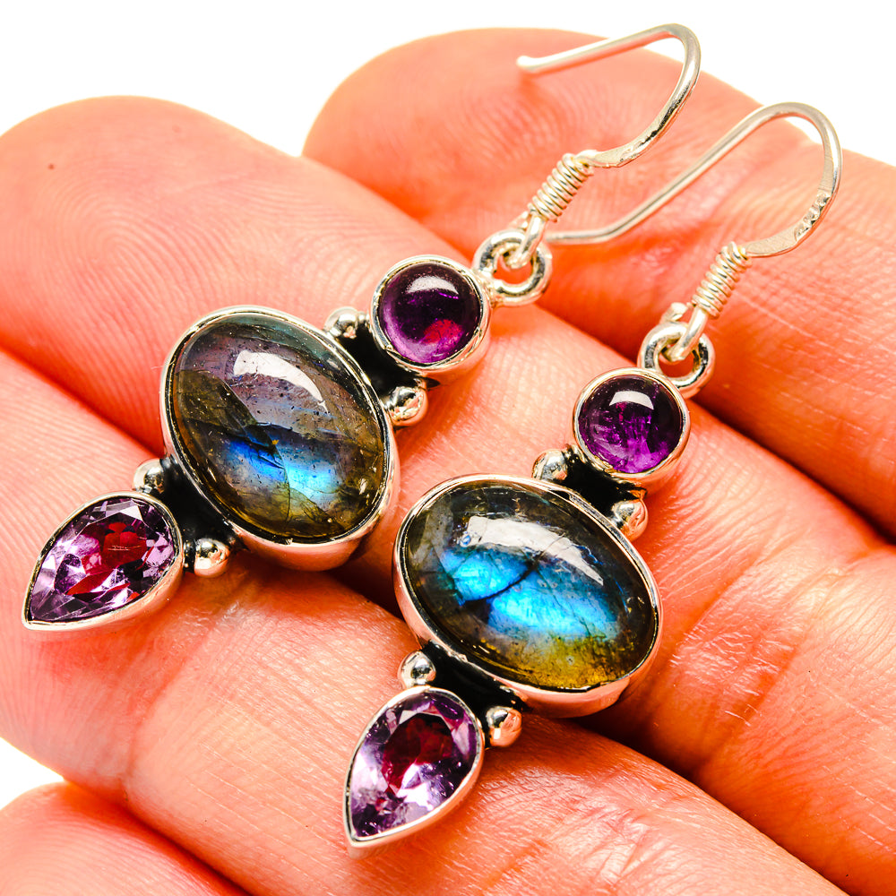 Sterling silver earrings with oval labradorite cabochons and amethyst teardrop stones