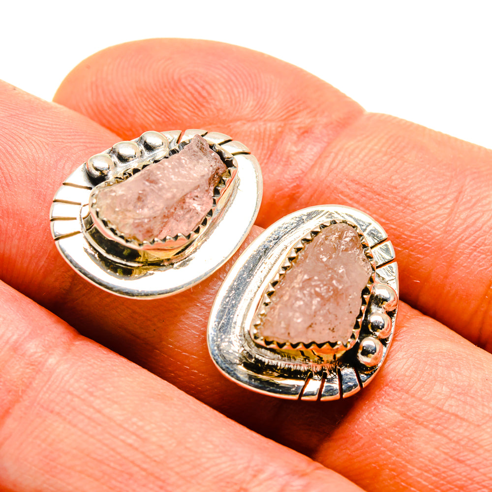 Rough rose quartz stud earrings with sterling silver oval bezel and textured frame