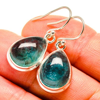 Sterling silver teardrop fluorite earrings with blue-green cabochon bezel and hook details