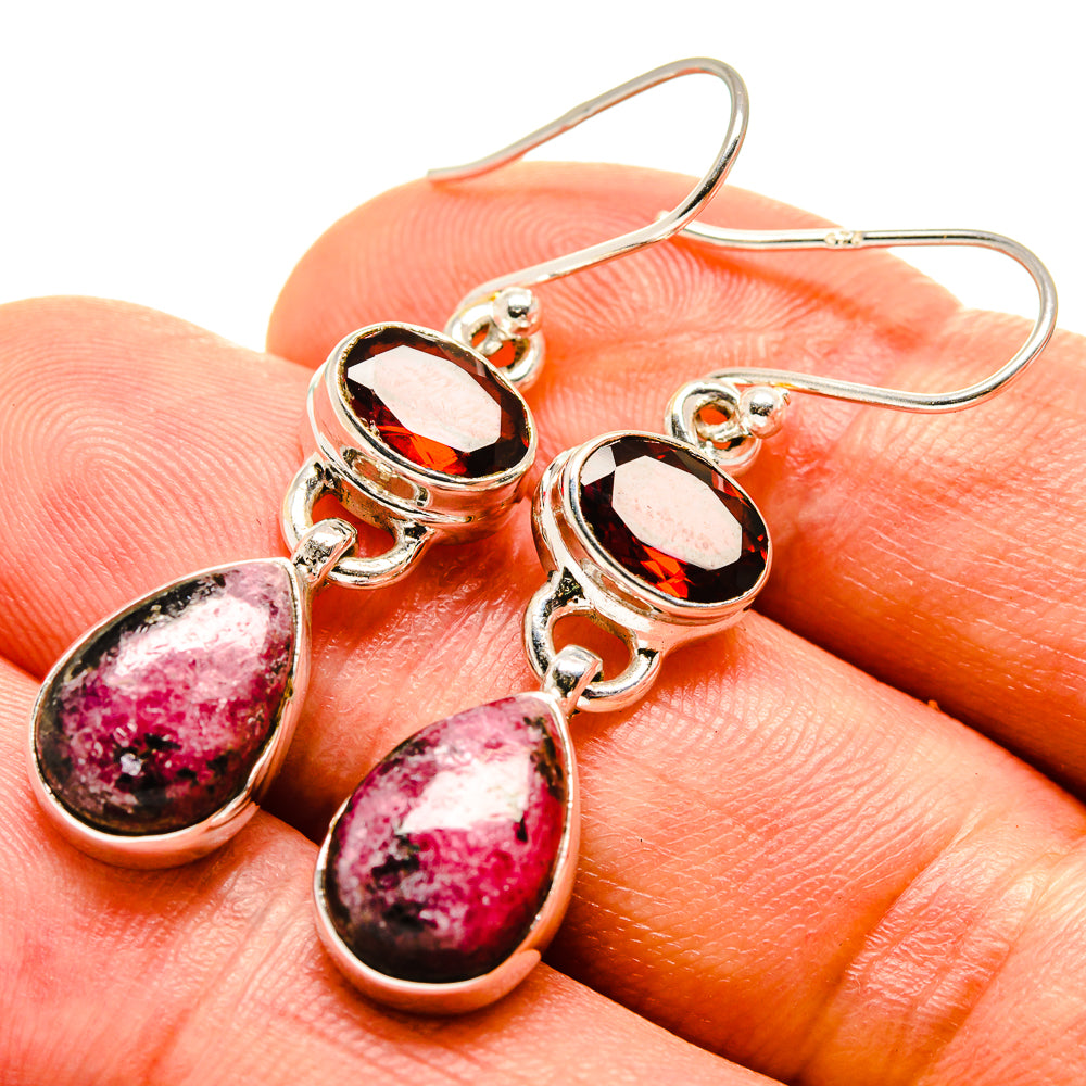 Sterling silver drop earrings with oval pink rhodonite and red garnet cabochons