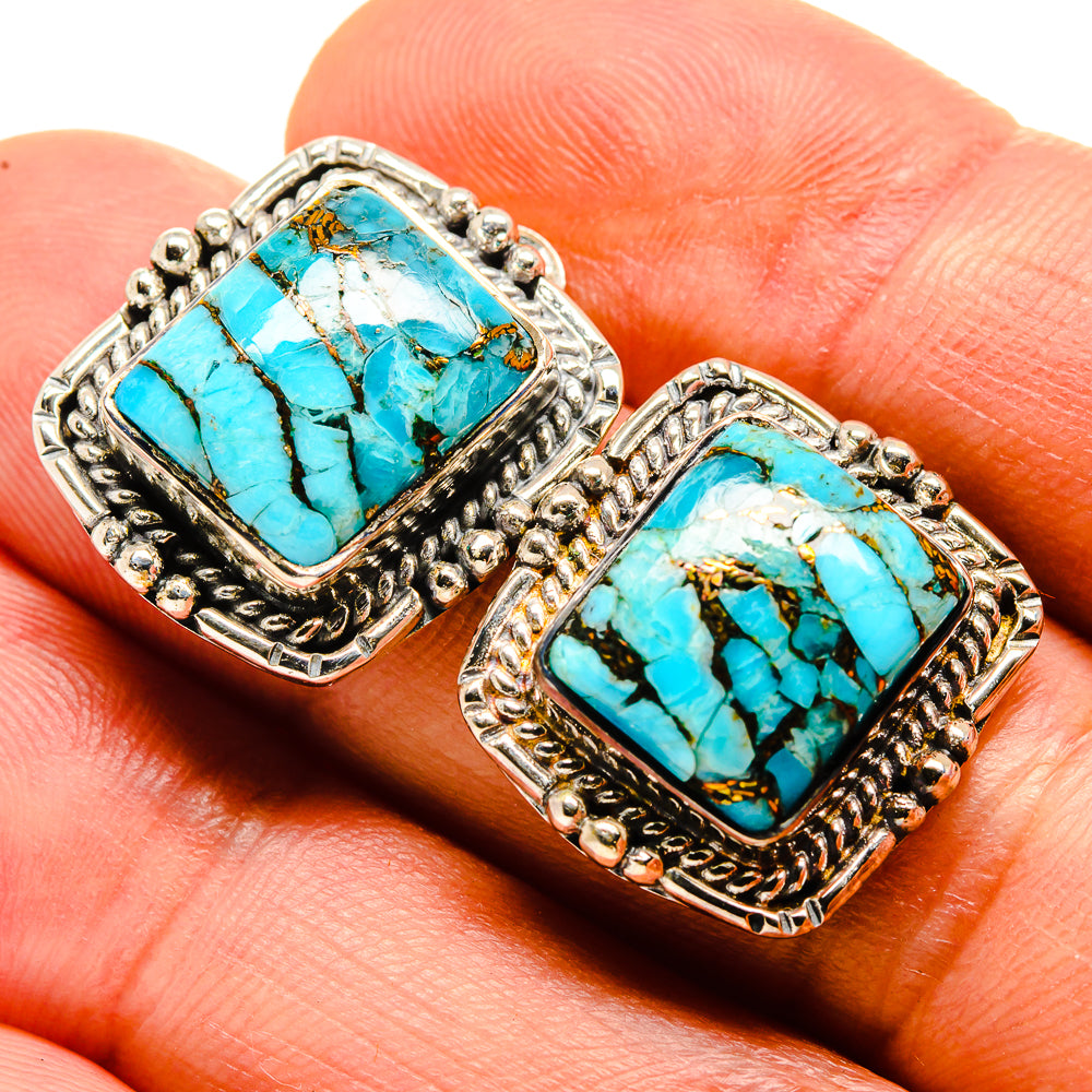 Turquoise stone square stud earrings in silver-tone ornate bezel setting