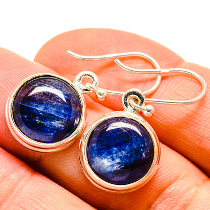 Round blue kyanite cabochon earrings in 925 sterling silver, close-up view