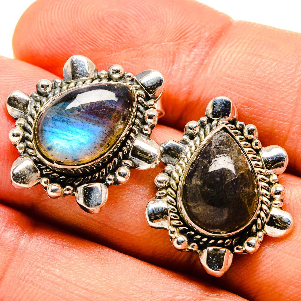 Labradorite drop earrings in silver tone with oval blue flash gemstone and bezel setting