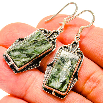 Rectangular green seraphinite drop earrings with 925 silver hooks, antique-style frame.