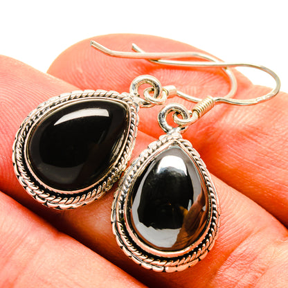 Teardrop onyx earrings with rope border, sterling silver hooks