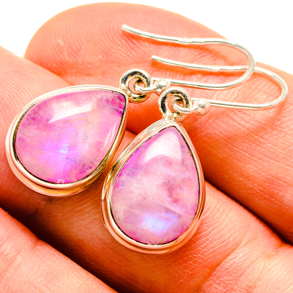 Pink moonstone teardrop earrings, silver-tone frame with gold-tone hooks