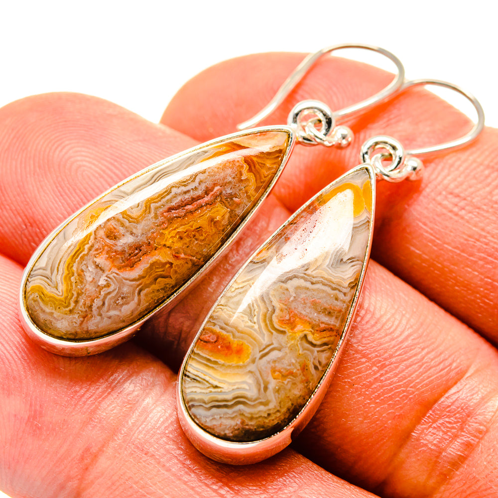 Teardrop crazy lace agate earrings, orange and white swirl stones with silver hooks