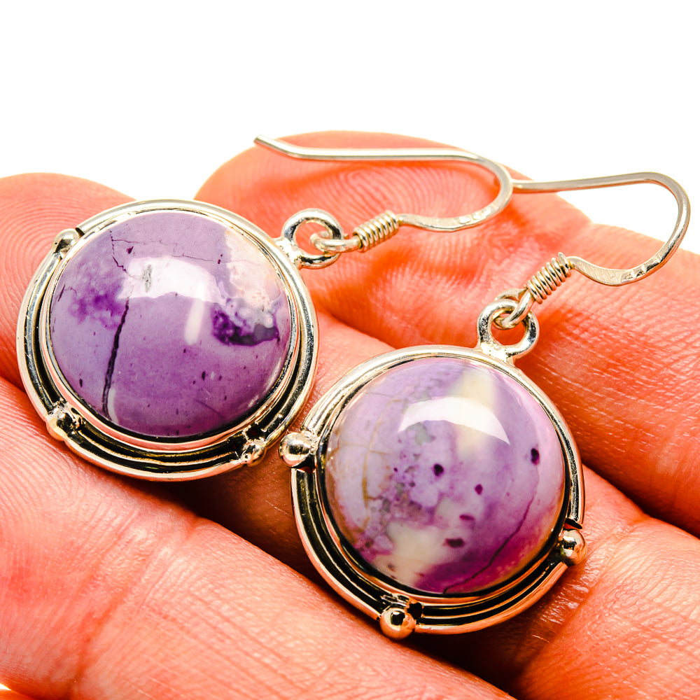 Tiffany Stone oval purple gemstone earrings, close-up on round cabochons and hooks