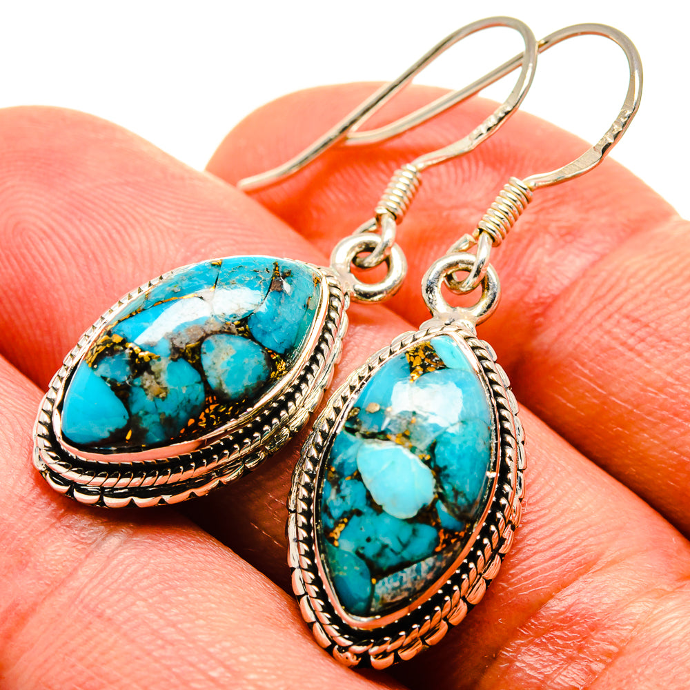 Turquoise oval drop earrings with silver-tone rope bezel and hook backs