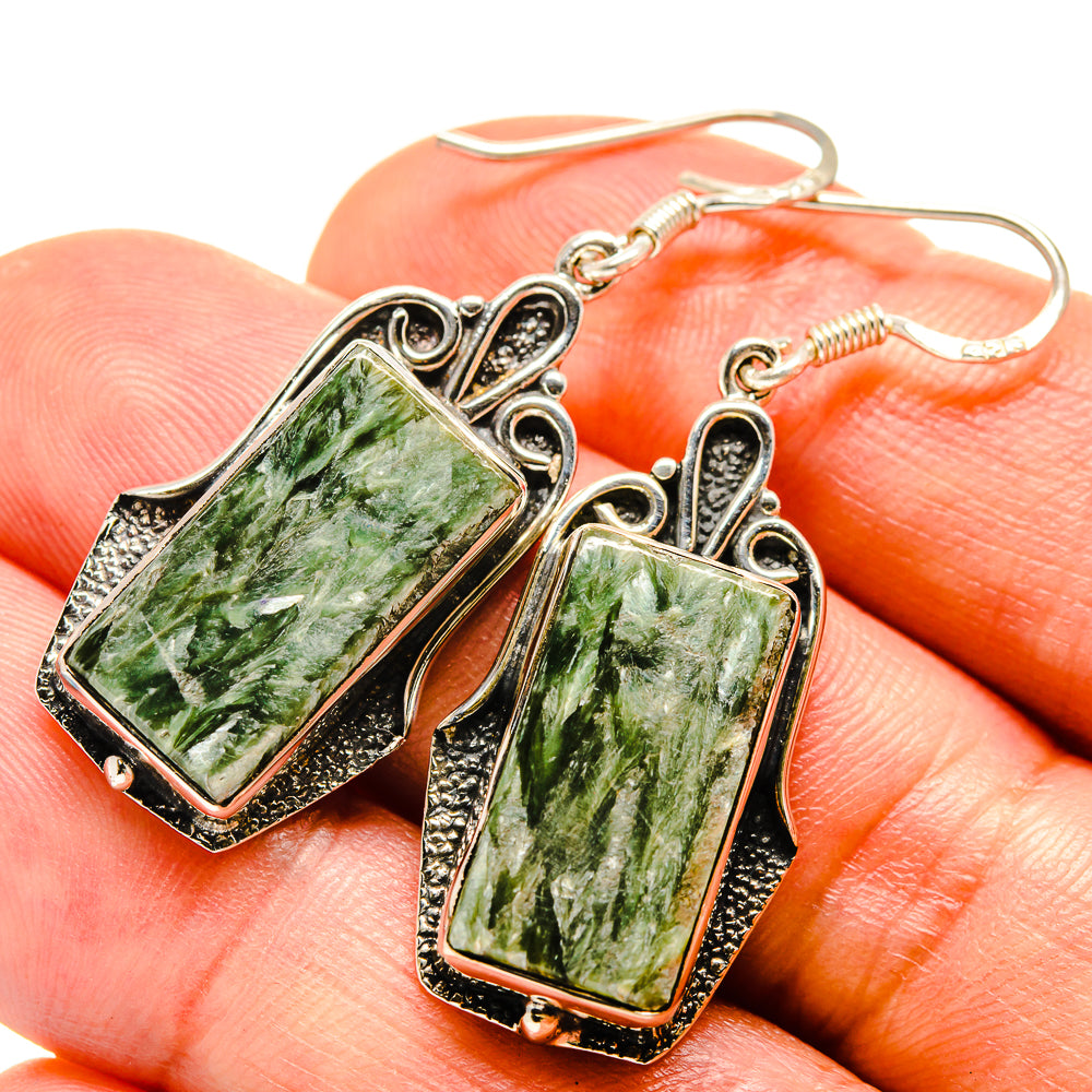 Seraphinite drop earrings with rectangular green marbled stones and silver hook backs