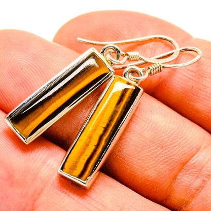 Tiger eye dangle earrings with silver hooks and gold-brown rectangular bars