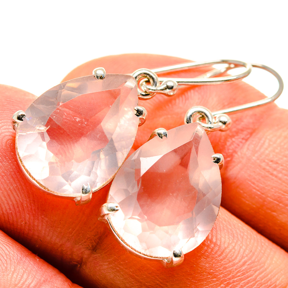 Faceted rose quartz teardrop earrings with gold-tone prongs and small hook backs