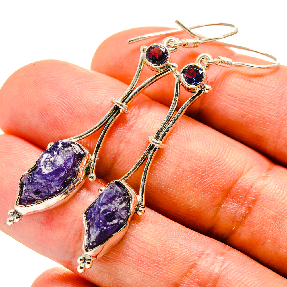 Dangle earrings with rough purple gemstone drops and gold-tone wire setting