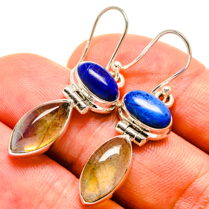 Sterling silver dangle earrings with blue oval stone and gold teardrop stone