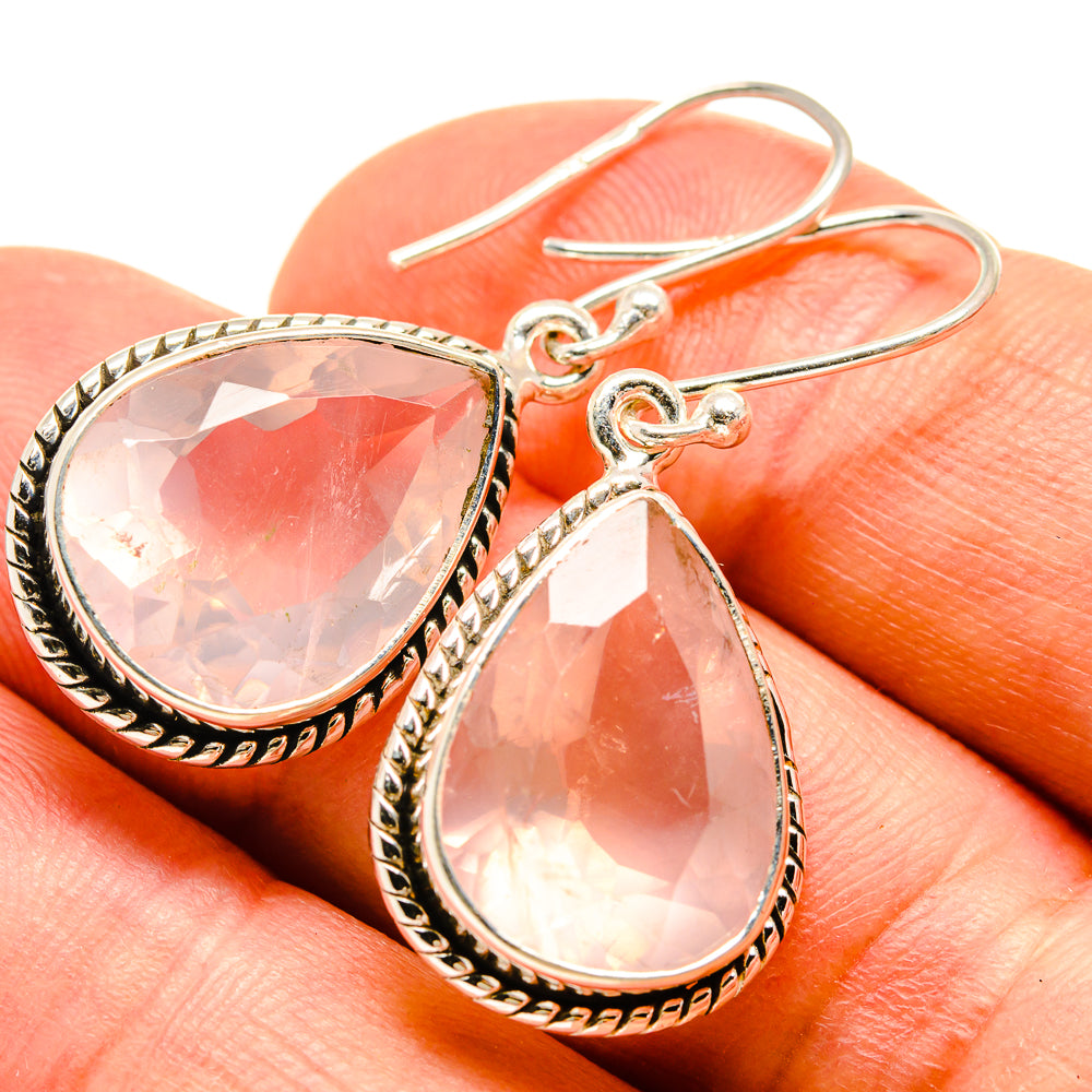 Sterling silver teardrop earrings with faceted pink rose quartz drops on hooks
