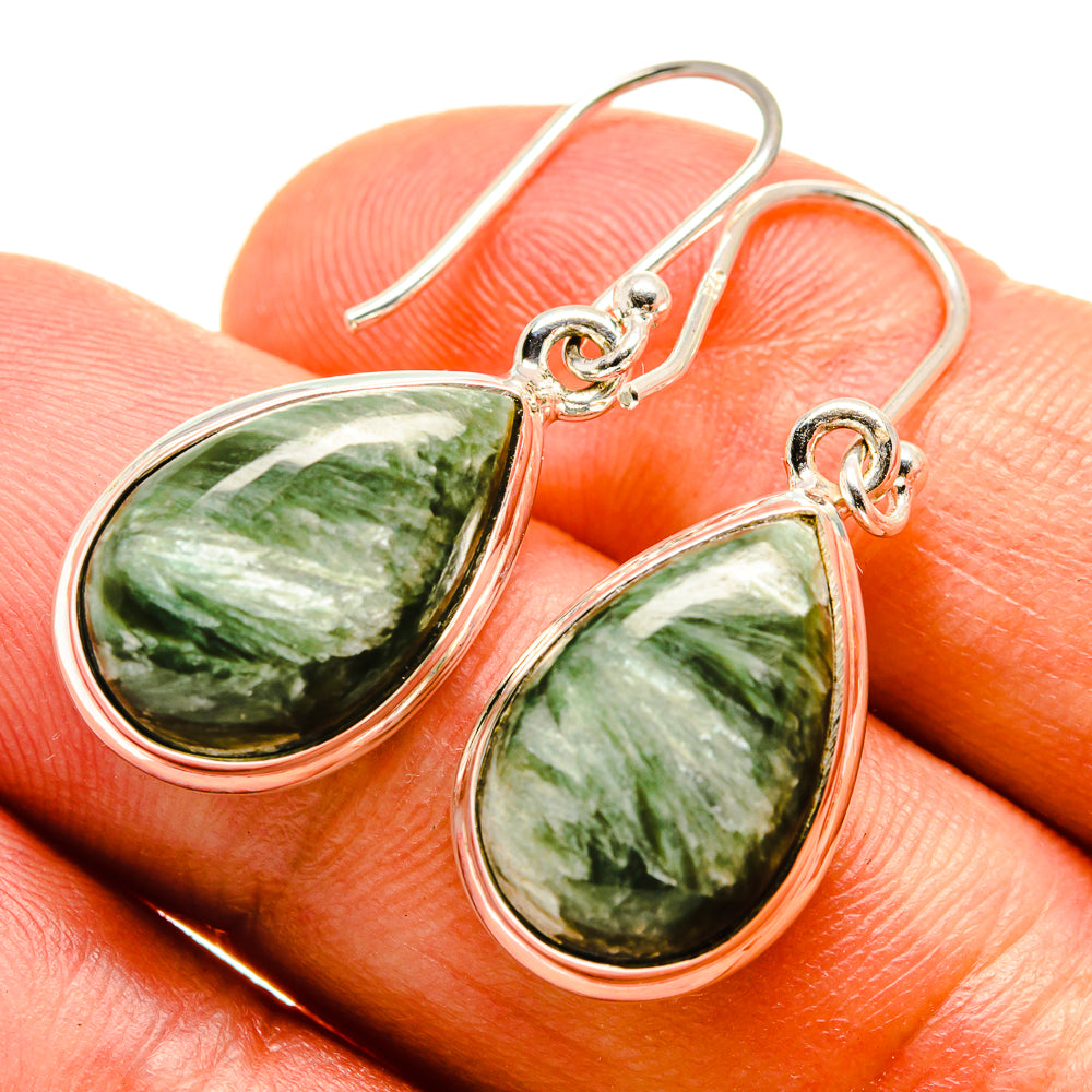 Seraphinite teardrop earrings with green marbled stone and silver bezel, on hook backs