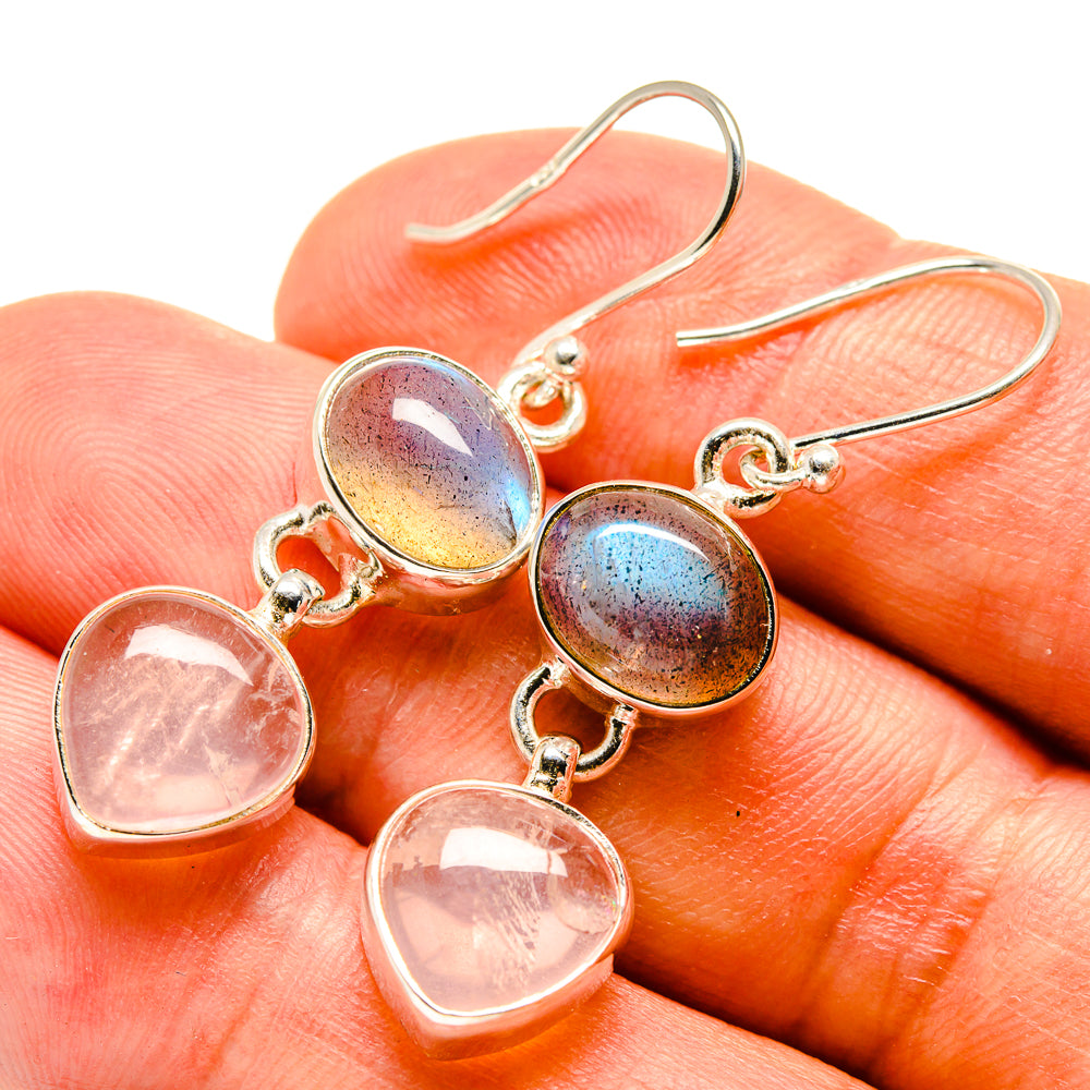 Sterling silver drop earrings with pink teardrop stones and iridescent oval tops