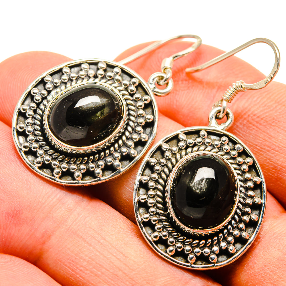 Sterling silver oval diopside drop earrings, beaded edge and black-green stone