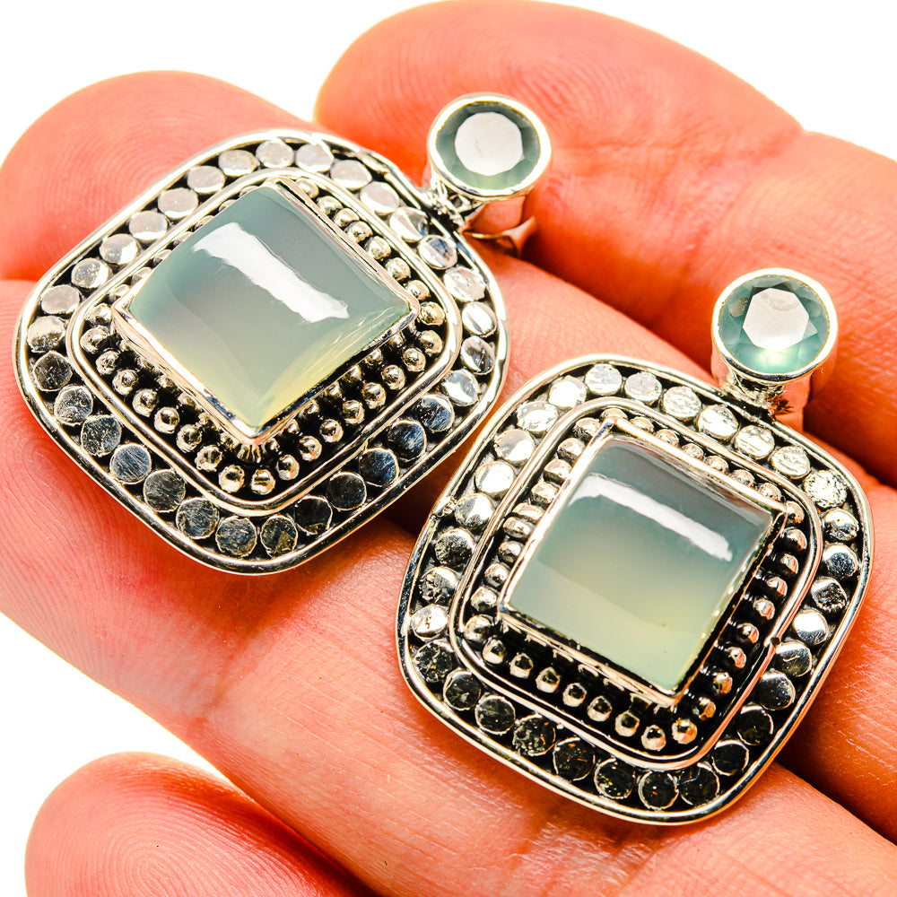 Ornate square-stone drop earrings with aqua centers, round top accents, rhinestone trim