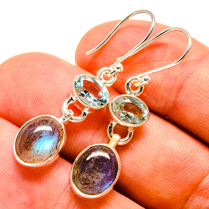 Sterling silver dangle earrings with blue topaz and labradorite oval stones
