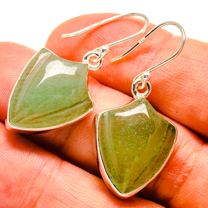 Prehnite earrings with shield-shaped green stones, sterling silver rims, fishhook