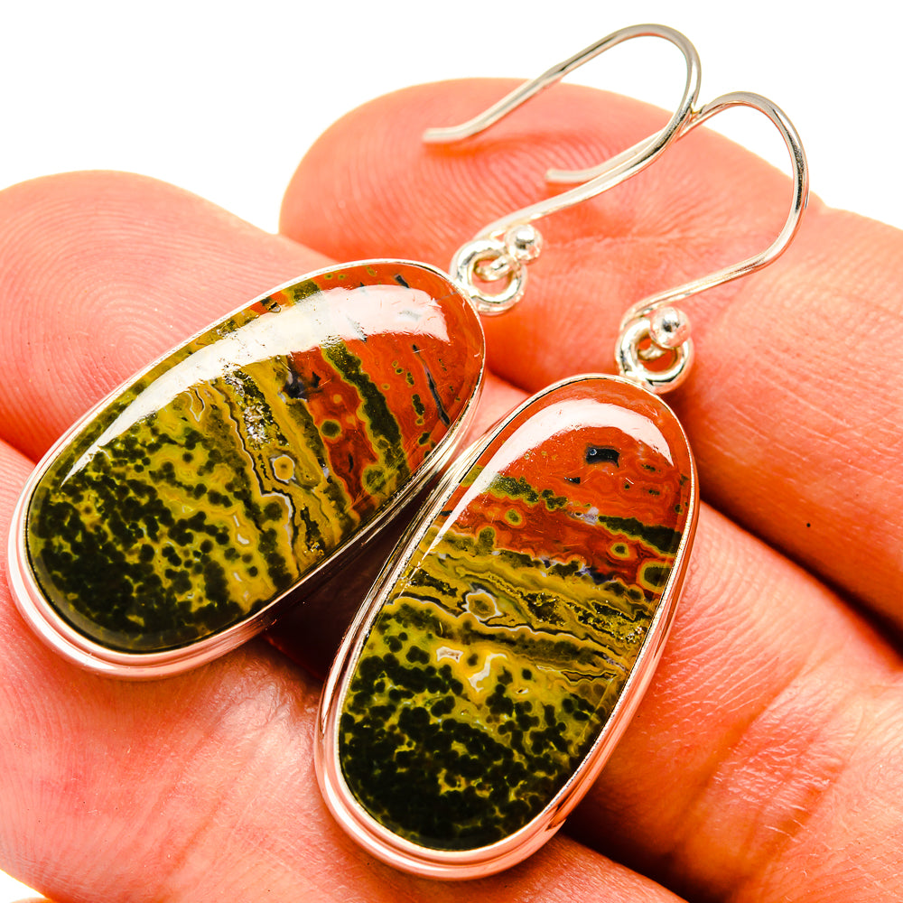 Sterling silver oval drop earrings with ocean jasper stones in red, green, and white