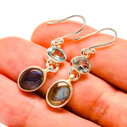 Sterling silver gemstone drop earrings with teal and dark blue oval stones
