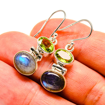 Sterling silver drop earrings with green peridot and round labradorite cabochons