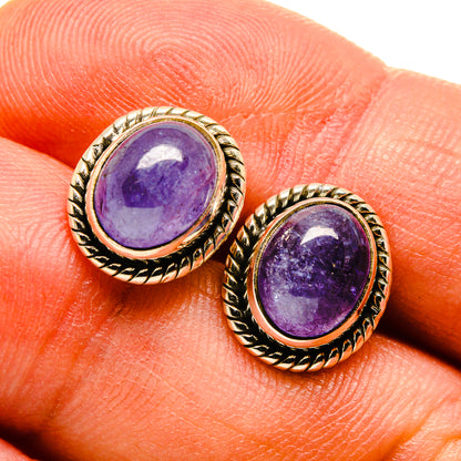 Oval purple gemstone stud earrings in gold-tone rope bezel, sterling silver posts