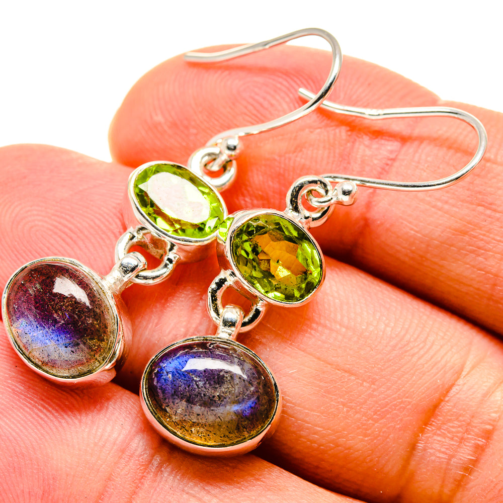 Sterling silver drop earrings with green peridot and iridescent purple labradorite stones