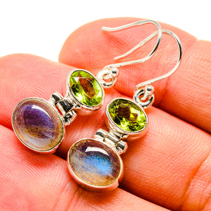 Sterling silver fishhook earrings with green peridot top and purple-blue labradorite ovals