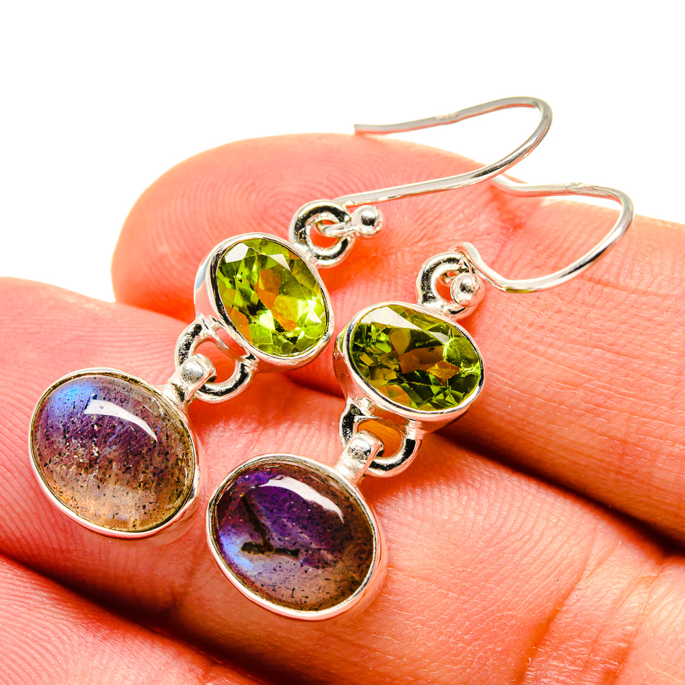 Sterling silver drop earrings with peridot green and purple iridescent round stones