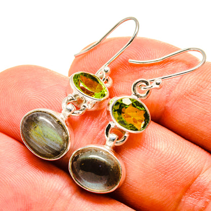 Sterling silver peridot and labradorite earrings, green oval drops with reflective dark stones
