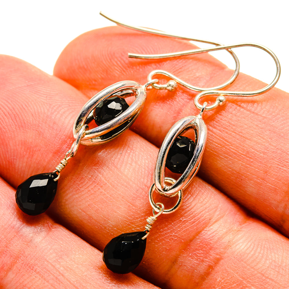 Sterling silver onyx earrings with oval black stones and black teardrop dangles