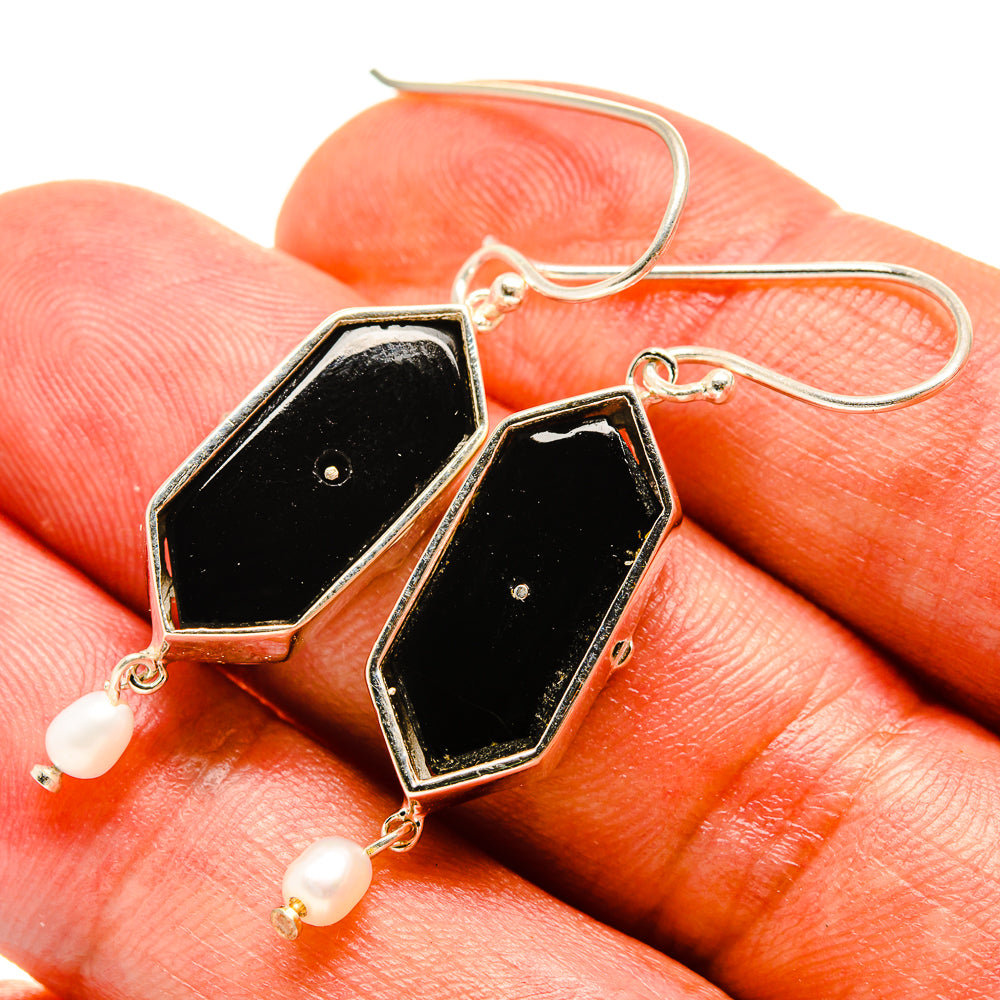 Hexagonal black onyx earrings with silver hooks and small cultured pearl drop beads