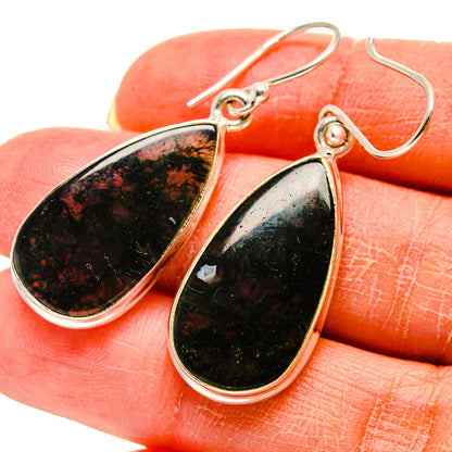 Moss agate teardrop earrings with silver-tone setting and green-black marbled stones