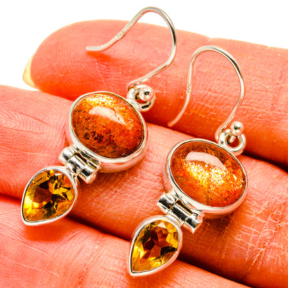 925 sterling silver hoop earrings with amber-orange oval stones and yellow citrine drop details