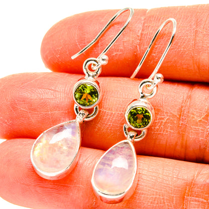 Sterling silver drop earrings with green peridot discs and pink teardrop moonstone