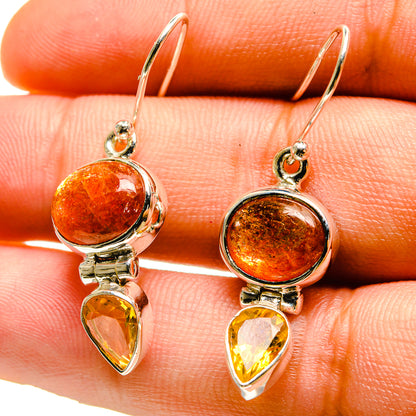 Sterling silver earrings with orange cabochon and yellow pear-shaped citrine drop