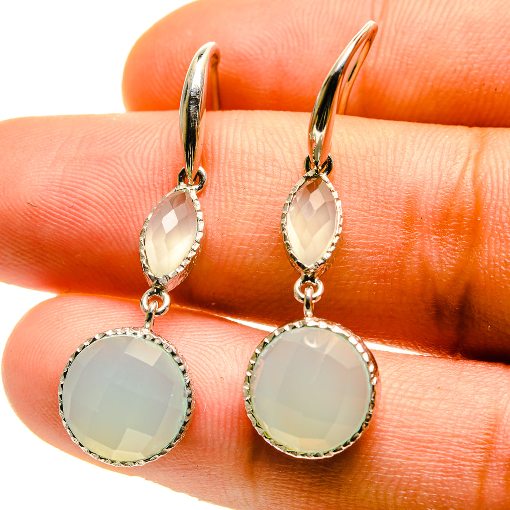 Aqua chalcedony drop earrings with faceted oval stones and sterling silver setting