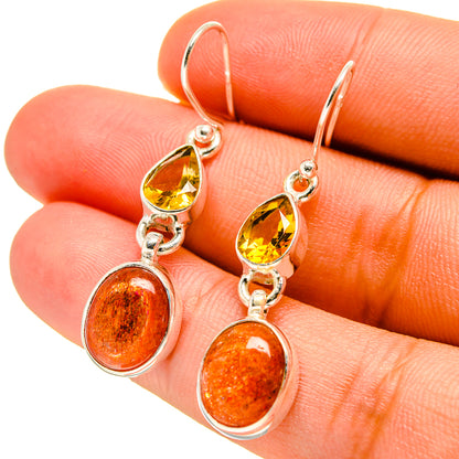 Sunstone and citrine drop earrings, silver hooks with orange round stones and yellow pear stones