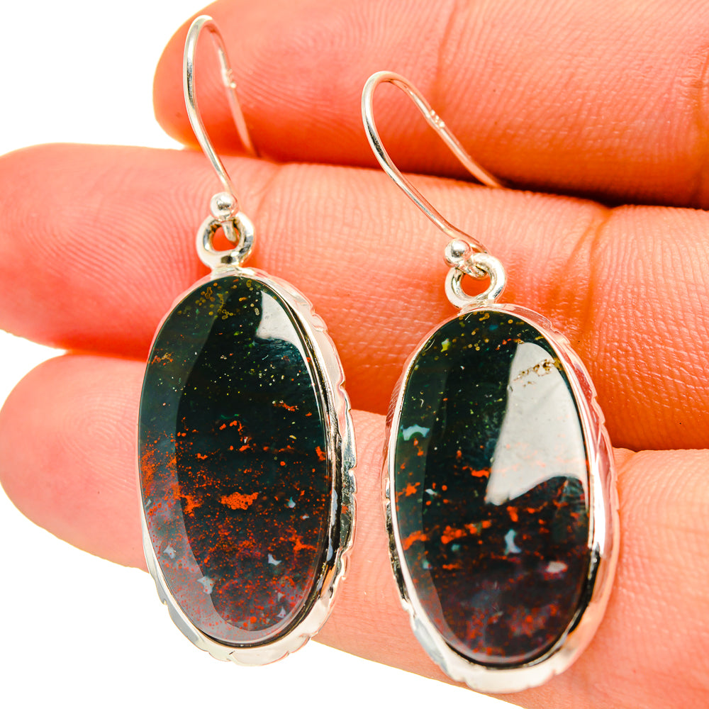 Oval bloodstone cabochon drop earrings, sterling silver hooks; dark green with orange specks