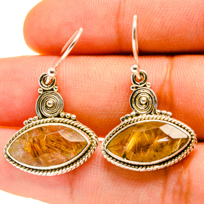 Rutilated quartz drop earrings, amber oval stones in ornate silver frames and hooks