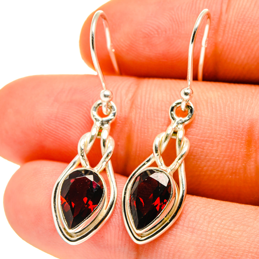 Garnet earrings in 925 sterling silver with round red gemstone and dangling link