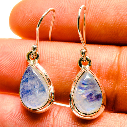 Moonstone drop earrings, pear-shaped blue opal-like stones on gold-tone hooks