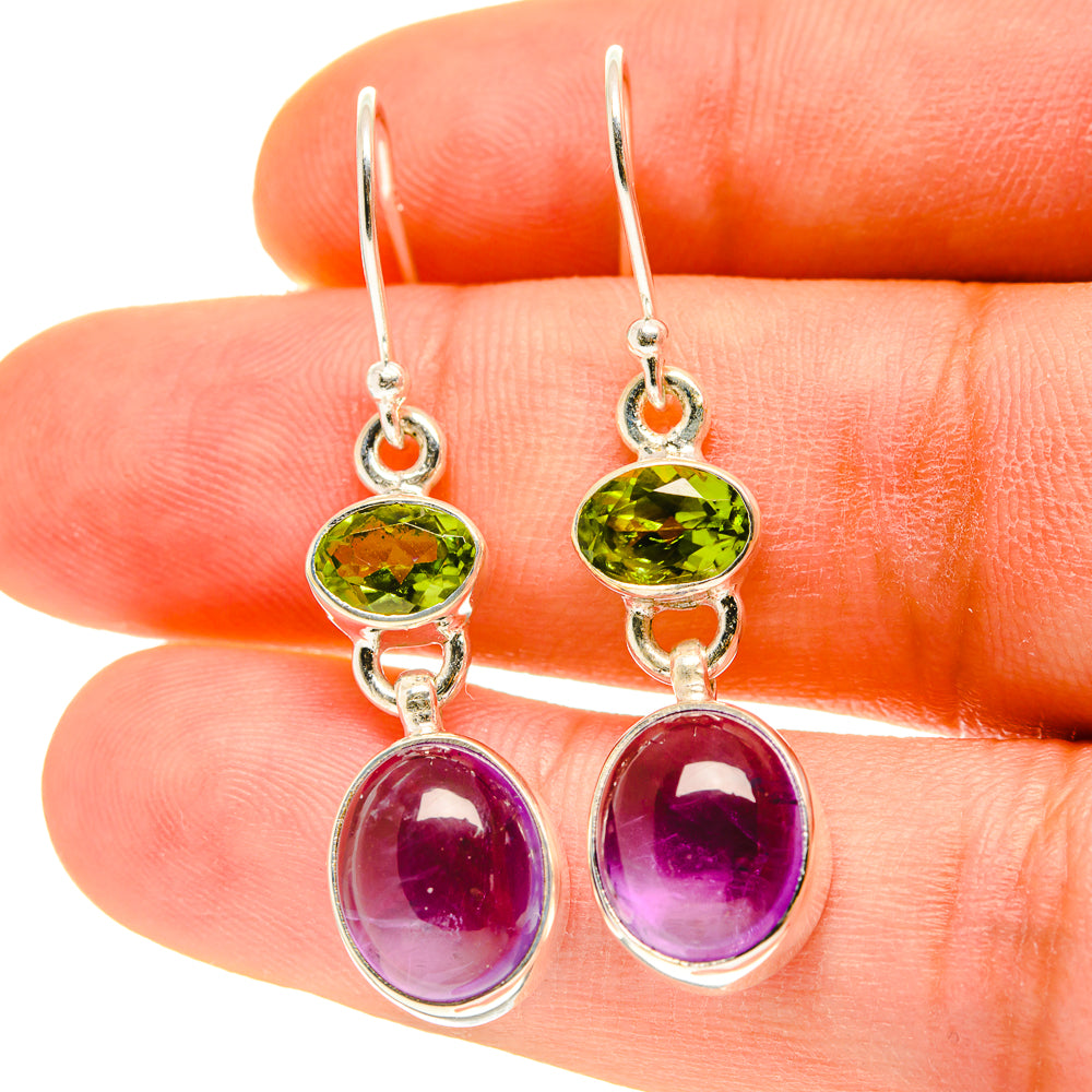 Amethyst and peridot drop earrings with oval purple amethyst and green peridot stones, silver fishhooks