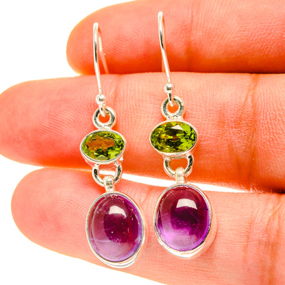 Amethyst and peridot drop earrings with oval purple amethyst and green peridot stones, silver fishhooks
