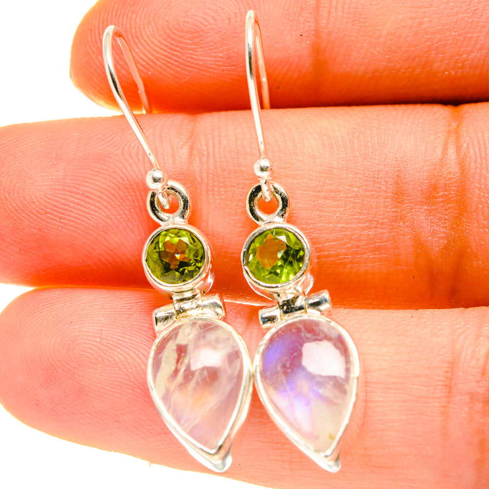Silver-tone peridot and moonstone drop earrings with green round stone and pear drops