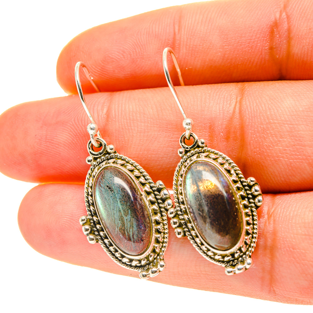 Labradorite oval drop earrings, iridescent blue-green shimmer, ornate gold-tone frame